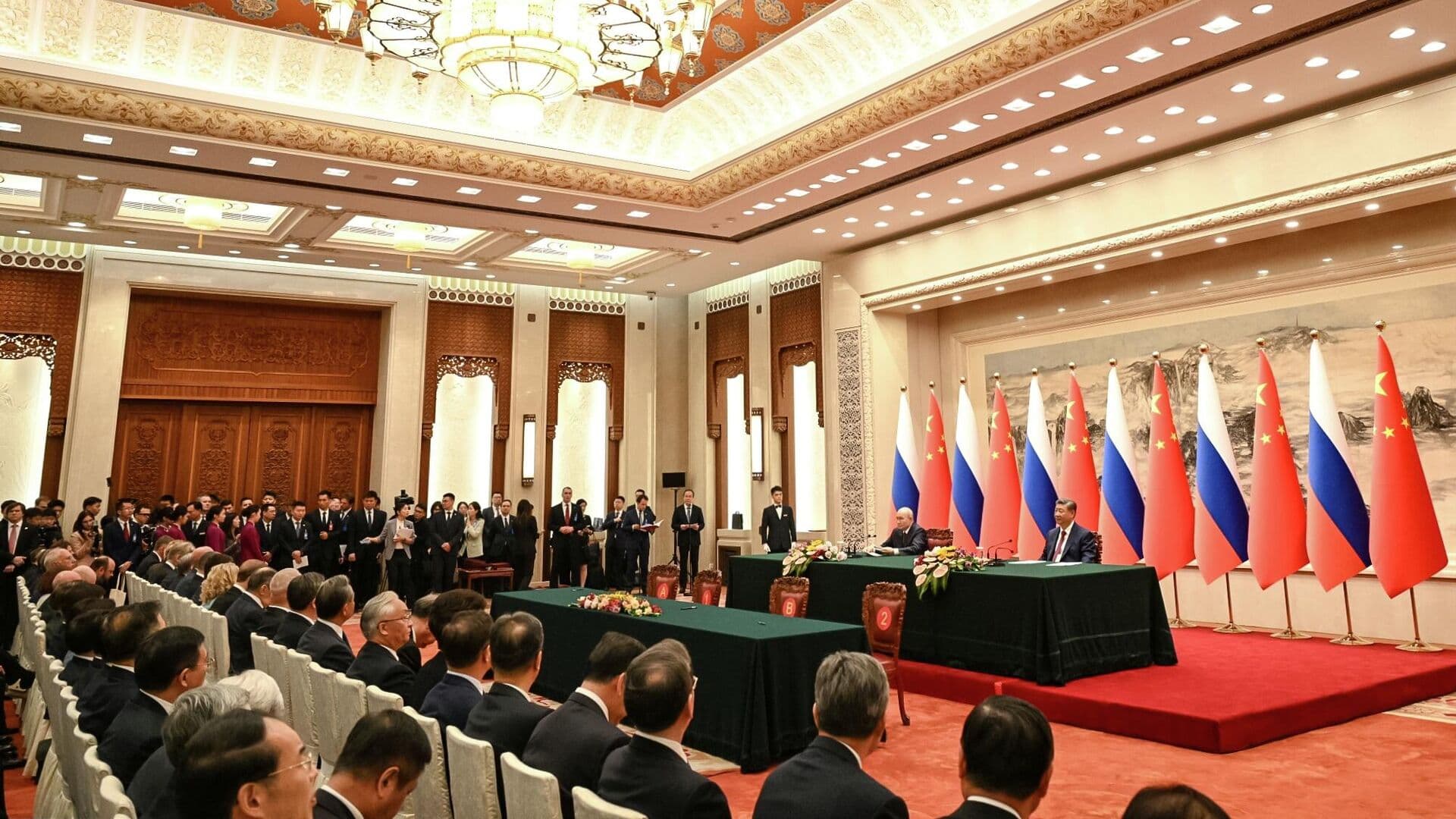 Россия и Китай выступают за защиту международного права, заявил Путин
