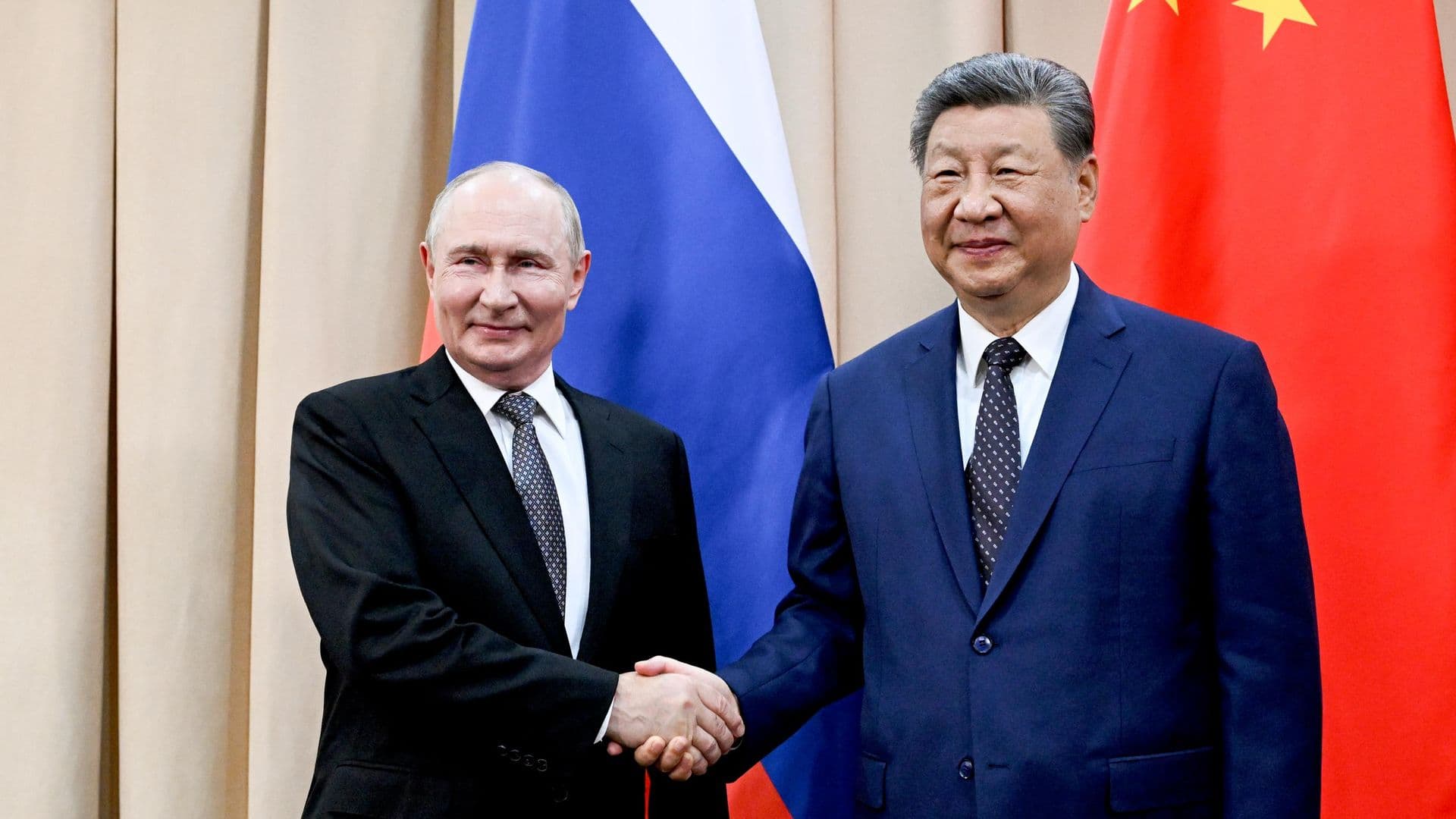 Путин поприветствовал Си Цзиньпина на китайском языке